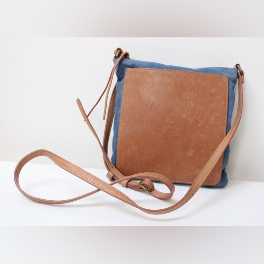 Feed cross body bag